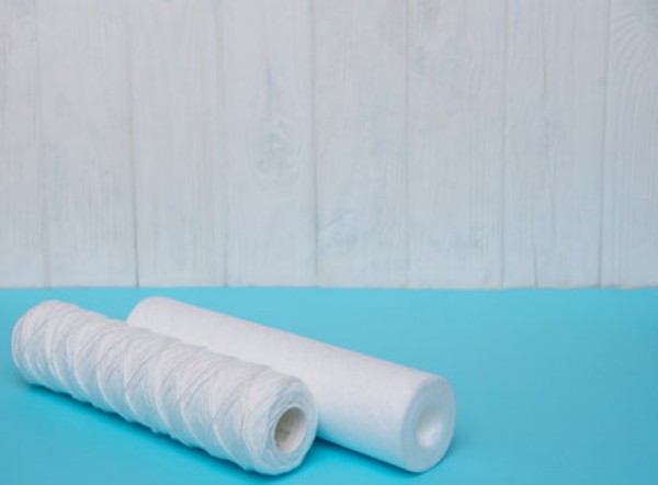 Between A String Wound And Melt Blown Filter Cartridges